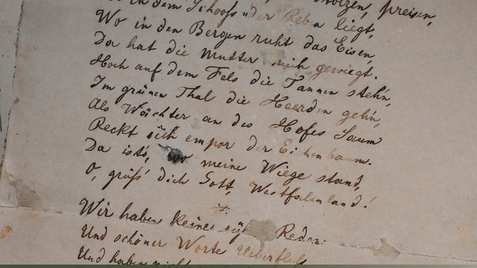 Veranstaltungsankündigung mit dem handgeschriebenen Text des "Westfalienlieds" (Bild: LWL/Wolff)